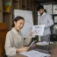office-workers-using-finance-graphs