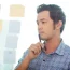 thoughtful-young-asian-business-man-planning-work
